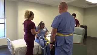 Physical Therapy Transfer Training  How To Transfer From Wheelchair To Bed [upl. by Arnst]